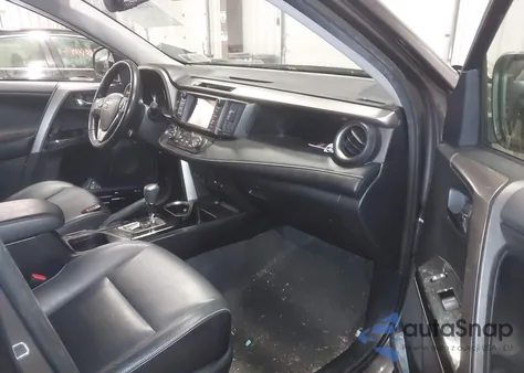 2018 Toyota Rav4 Limited z USA, uszkodzony, nr VIN JTMDFREV2JJ200396